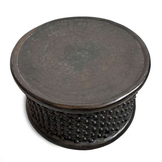 Authentic vintage hand carved Bamileke tribal wood stool/side table. Masterfully crafted from one piece of indigenous...