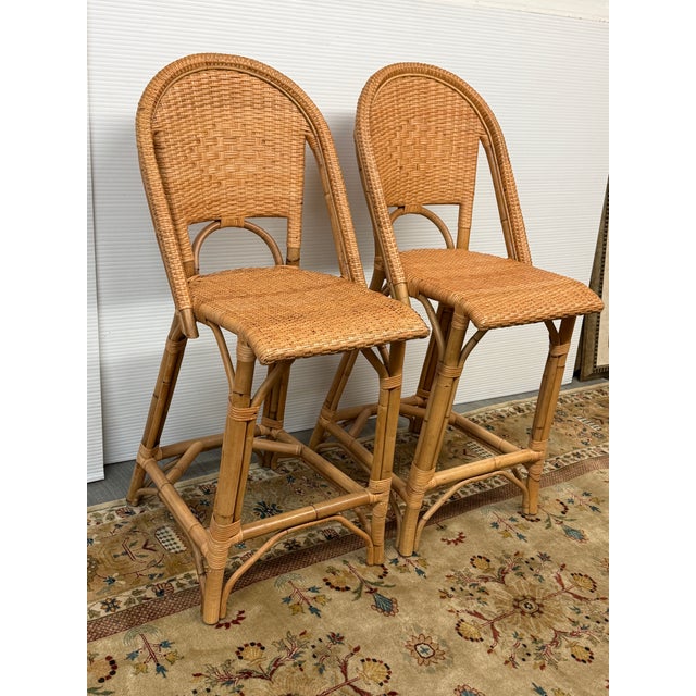 Design Plus Gallery presents a Pair of Natural Sunwashed Rivera Rattan Counter Stools from Serena & Lily. These stools are...