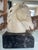 Late 20th Century Italian stone horse head sculpture mounted on a black marble base. Sculptural and timeless, with elegant...