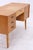 Vintage desk from the 1960s with clean lines and a practical layout. Three drawers, a lockable center drawer, and a...