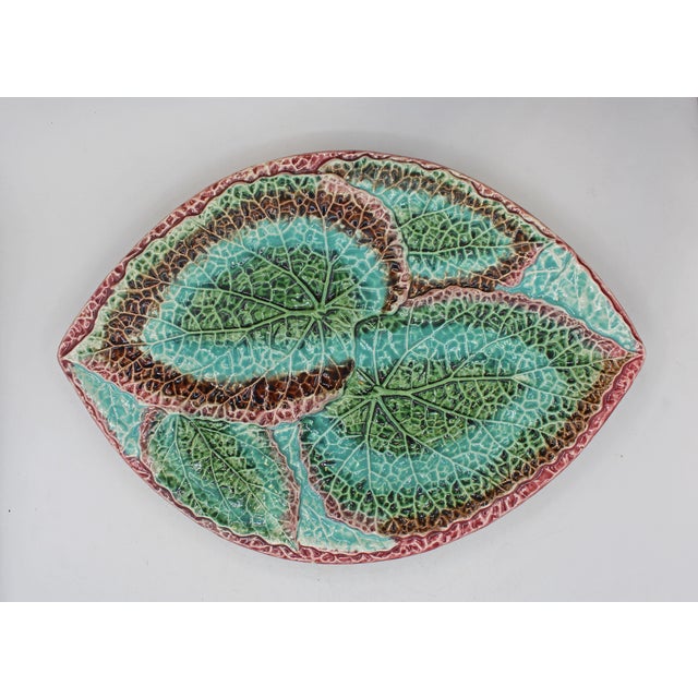 English majolica large begonia leaf oval platter, circa 1880. Oval 1/2" deep foot rim. Lilac, brown, green & blue....