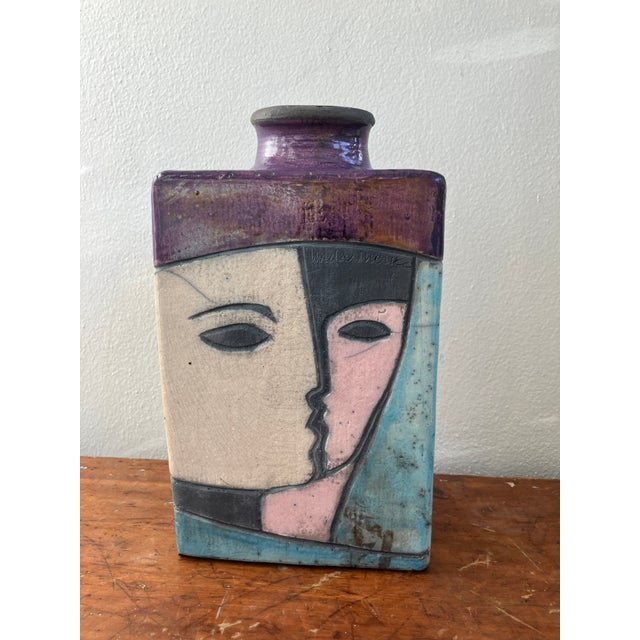 Original modernist raku vase by American artist Linda Mielke, circa 1960s. The piece is signed on the front face. The...