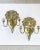 An elegant pair of Silver Sconces, with a gold wash, exhibiting magnificent of a lion, a crown, and a unicorn. Three arm...