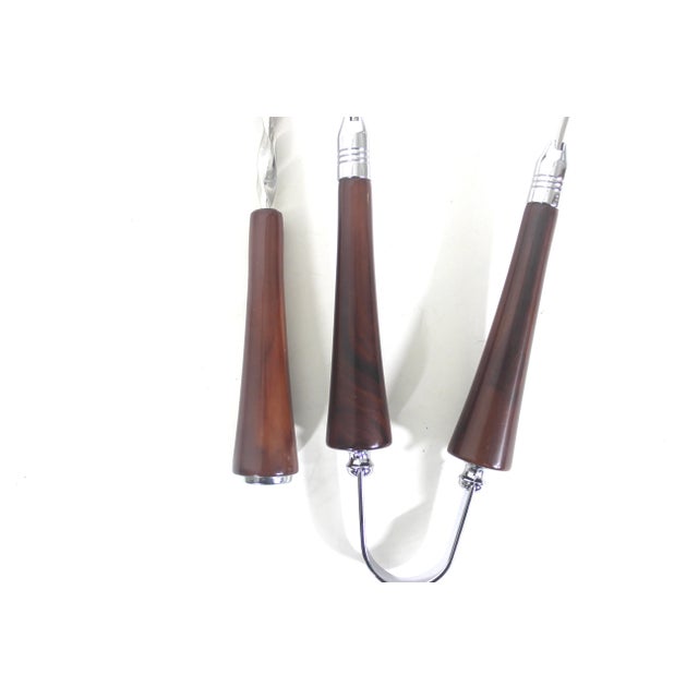 This is a great two piece set of bar tools for styling your bar cart. These have swirled brown bakelite handles with...