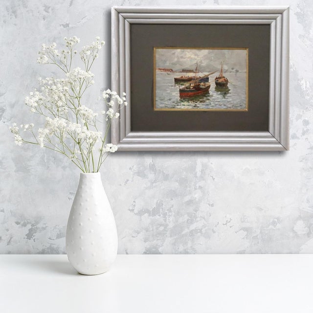 We are pleased to present this early 20th-century oil on board painting. This splendid view of the Gulf of Naples is...