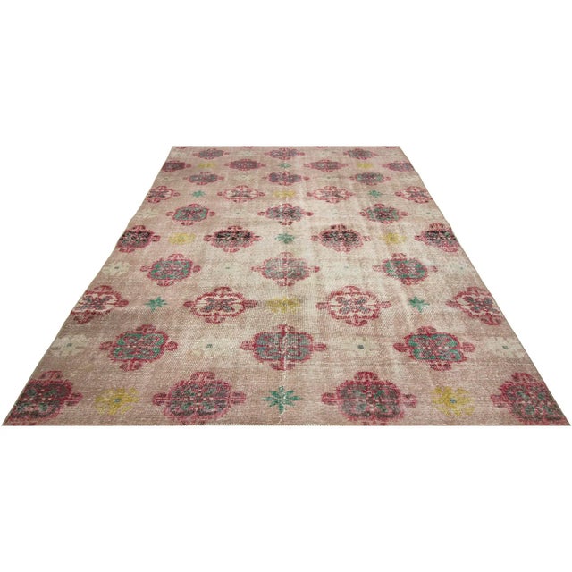 Handknotted vintage rug from Oushak region of Turkey. Approximately 50-60 years old. In very good condition