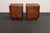 Stylish, practical nightstands/chests/besides/end tables in stained mahogany on rosewood plinth bases (ca. 1960s, USA)....