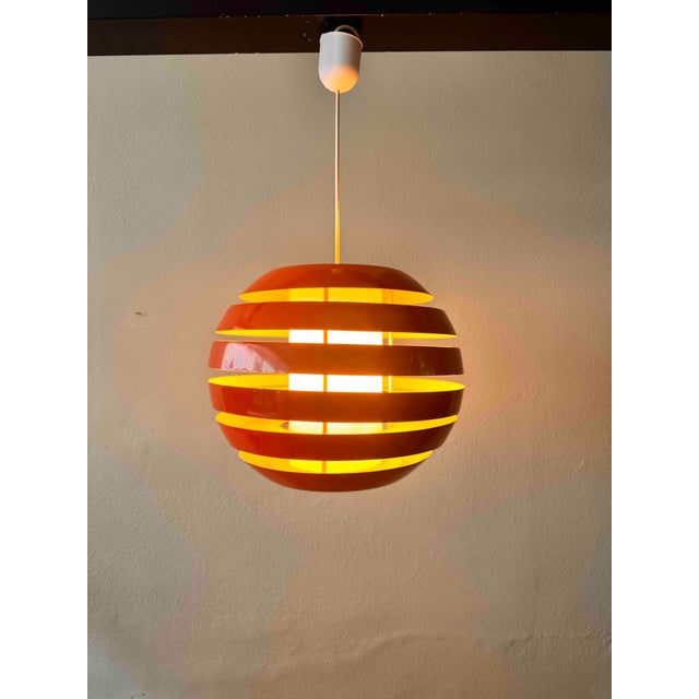 Designed by Carl Thore and produced by Granhaga Metallindustri in Sweden during the 1960s, the “Le Monde” pendant lamp is...