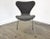A mid century modern chrome series 7 style desk or dining chair with a grey tweed like fabric. Seat height is 17.25”....