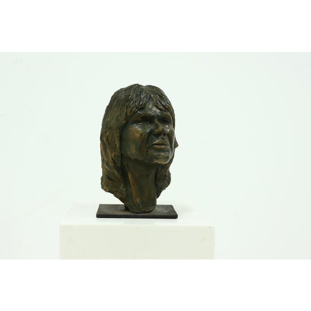 Studio made clay portrait head dating from the 1970s. Part of a series of seven individually sculpted works by the same...
