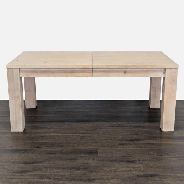 Crafted from pine in a Desert Pine finish. The table has 2 drawers and a drop-in extension. The leaf adds 18 inches to the...