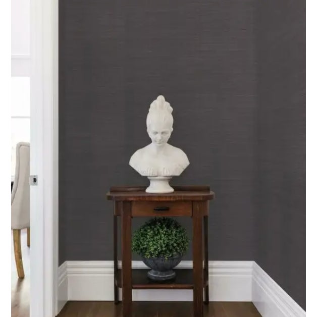 Slender horizontal strands are affixed to a plain background with tiny vertical stitches to create Multi Grass Wallpaper,...