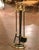 Weighing at an impressive 15 pounds, this elegant vintage fireplace tool set, traditionally known in France as a serviteur...