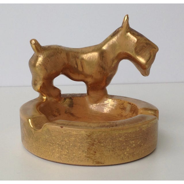 Vintage 1960s Stangl ceramic gilt gold strie designed scottie dog emblazoned ashtray, accent or catchall dish. Perfect for...