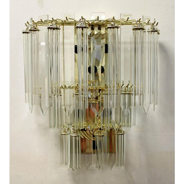 For your consideration is a Murano wall sconce, made of brass and glass, circa the 1960s. In good vintage condition. The...