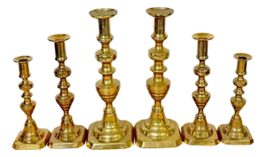 Three Pair of 19th C. English Brass Graduating Beehive Push-Up Candlesticks