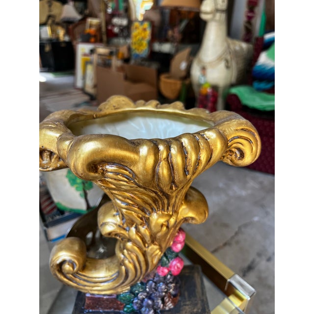 Up for consideration is a beautiful Hollywood regency gold chalk ware vase. This would look lovely in your home and it is...