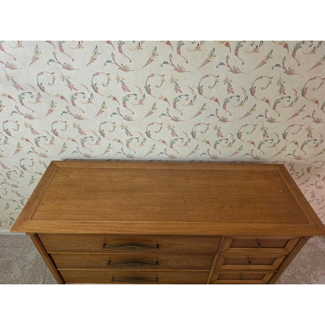 Complete your mid-century interior layout with this rare vintage bachelor's chest credenza dresser from the iconic...