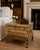 A wonderfully theatrical vintage side table designed as a stack of four oversized, timeworn books. The wood structure is...