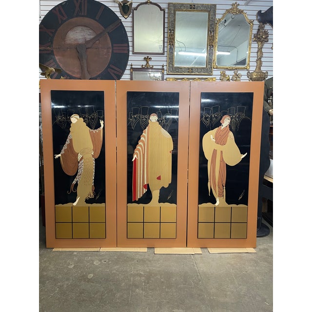 A set of three large Art Deco style wall-mounted panel screens by the Russian artist known as Erté (Romain de Tirtoff)....