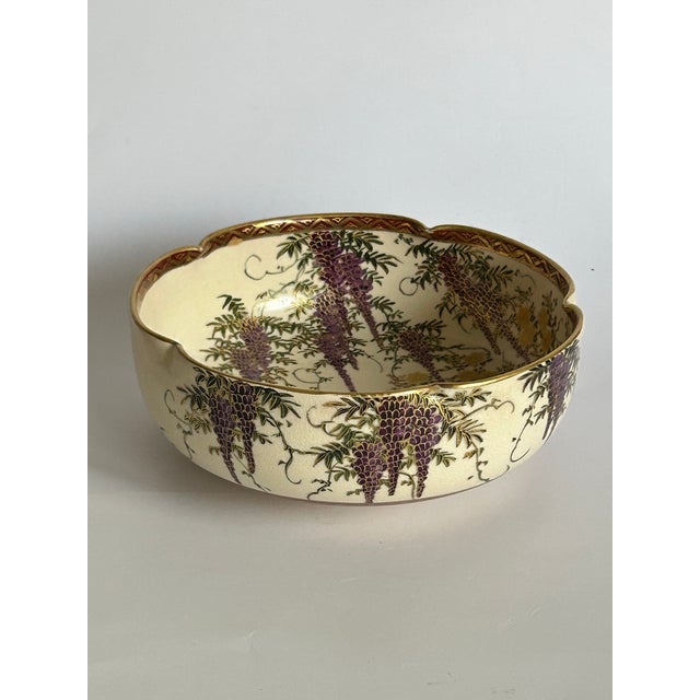 A refined antique Japanese Satsuma-style decorative bowl from the late Meiji period (circa 1890–1910), distinguished by...