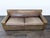 This Mitchell Gold 3-seat sofa features a classic, sturdy design with brown leather upholstery. The sofa provides...