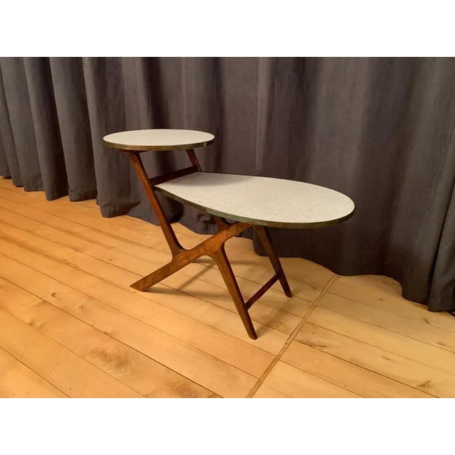 Flowerbed from the 1960s. In original and very good condition. High quality workmanship of solid wood, brass and veneer....