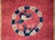 A wonderful early 20th century Chinese Art Deco rug with a central billowing cloud medallion surrounding a Phoenix, and...