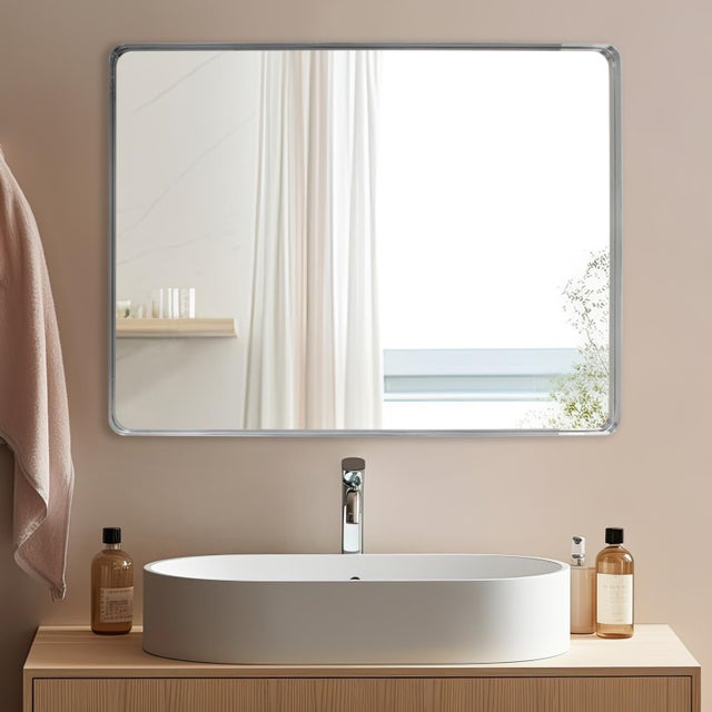 With the idea that less is more, our Steele Mirror features a simple mirror trimmed in a flat, shadow box styled stainless...