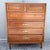 Mid-Century Modern six-drawer highboy dresser from the Cliff House collection by Heywood-Wakefield. The tall case features...