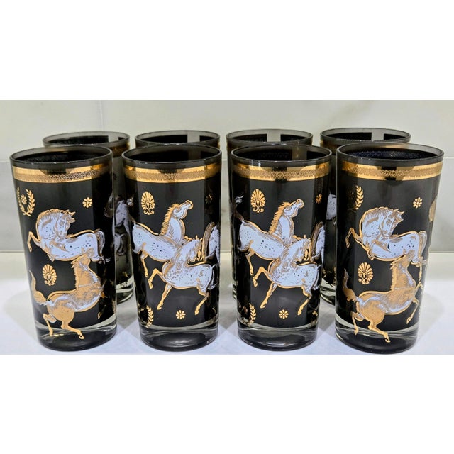 An exceptional set of eight vintage Culver-Attributed "Ming" Wild Horses highball glasses, featuring dramatic smoky...