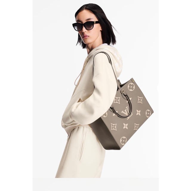 Louis Vuitton On The Go BICOLOR MM Monogram Empreinte Leather, Dove/Cream Color: Dove/Cream The OnTheGo MM is a medium-...