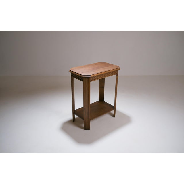 French Art Deco side table, circa 1930, characteristic of a period in which furniture still drew on the classical...