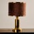 A truly classic and elegant piece. German brass table lamp with rounded shapes and a velvet lampshade from the 1970s. The...