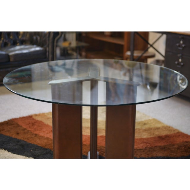 A stunning circular table, an iconic example of 1970s Italian design, by Tito Agnolli and created for Matteo Grassi, a...