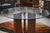A stunning circular table, an iconic example of 1970s Italian design, by Tito Agnolli and created for Matteo Grassi, a...