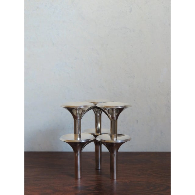 Couple candle holders Brutalists stackable designed by designers Ceasar Stoffi and Fritz Nagel, silver metal, made in...