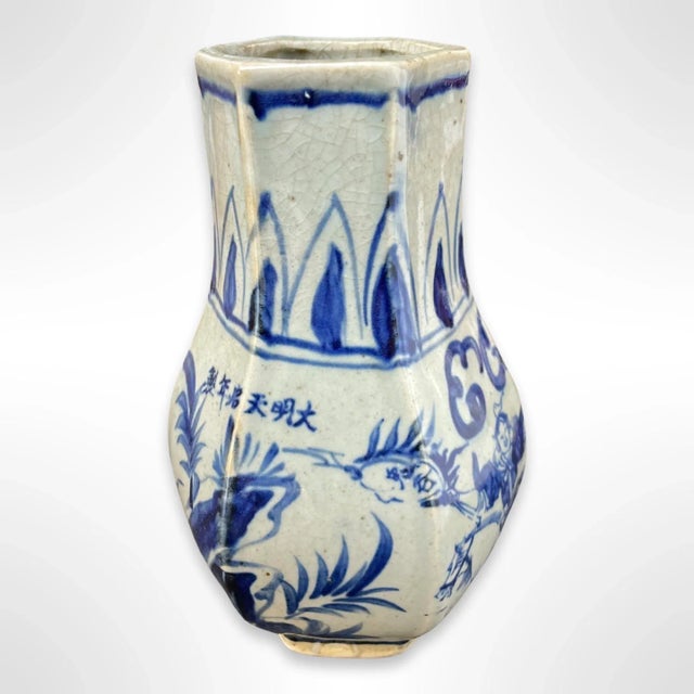 Antique 19th century Chinese blue and white ceramic meiping vase in a rare hexagonal form. The exterior features hand-...