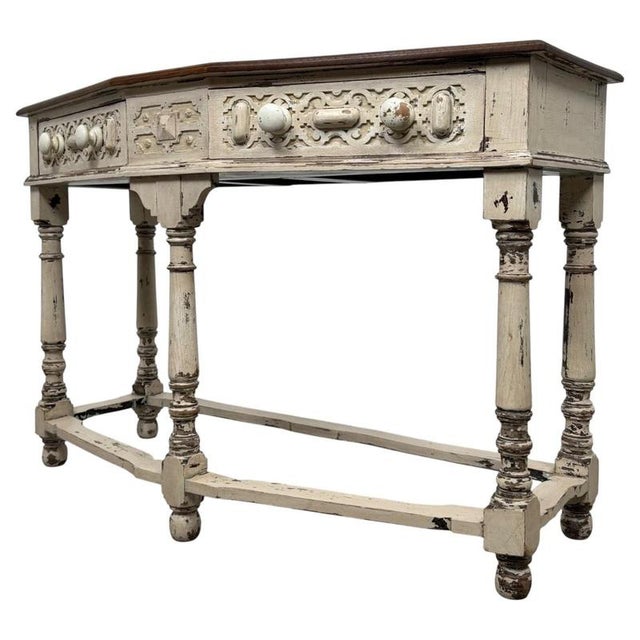 A handsome and highly characterful 20th-century English console table in the traditional Country House style, beautifully...