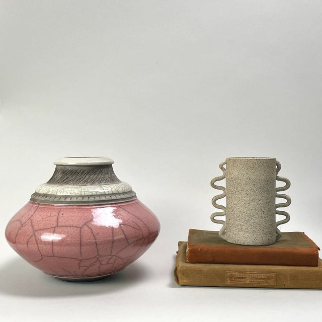 Vintage Pink Raku Fired Incised Ceramic Vessel, Signed (1993). Crackle pink Raku vessel with an incised three layer rim....