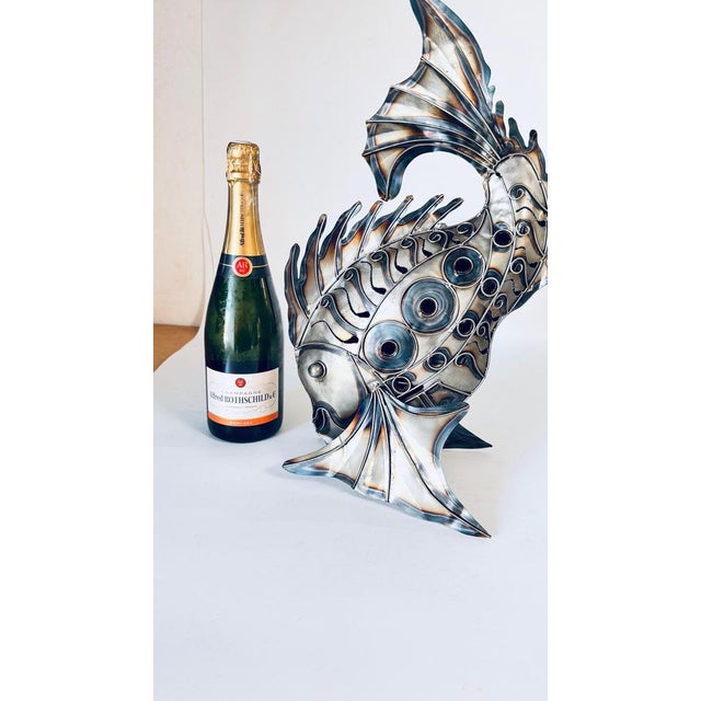 Metal Fish Sculpture with Subtle Reflections, 50 cm, Modern and Versatile Design This stunning metal fish sculpture...