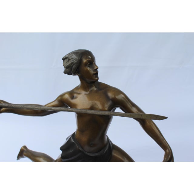 A great super action sculpture of a male hunter after two gazelles. Has a signature on the base of Ketley. A great big...