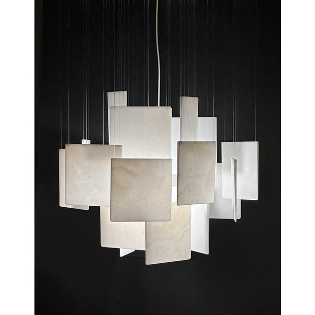Ingo Decorative Ceiling Lamp in Bianco Carrara Marble by Bufalini Marmi Dimensions: Ø 70 x H 55 cm. Materials: Bianco...