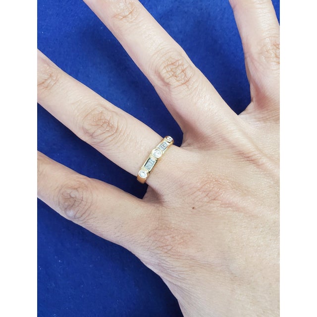 ♥ Product Summary ♥ Main Stone: Diamonds Approx Total Carat Weight: .26cttw Diamond Cut: Round & Baguette Band Material:...