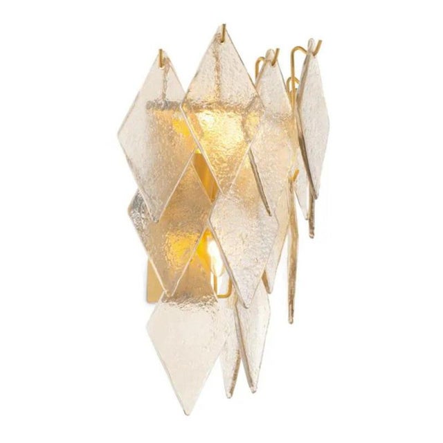 Pair of contemporary wall lamp in antique brass finish and handmade sugared glass, designed as a contemporary geometric...