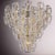 Italian chandelier shown with clear Murano glass hooks decorated with amber stripes in the center, mounted on chrome...