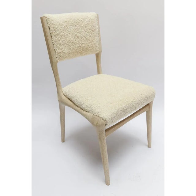 Custom Mid Century style oak dining chair in ivory boucle.