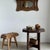 Antique teak wall mirror. Architectural frame composed of a central oval mirror flanked by openwork side panels...