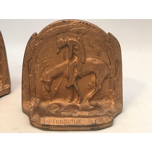 Art Deco gilt bronze "The End Of The Trail" bookends for your consideration. Each bookend measures approx. 3 3/4 inches...