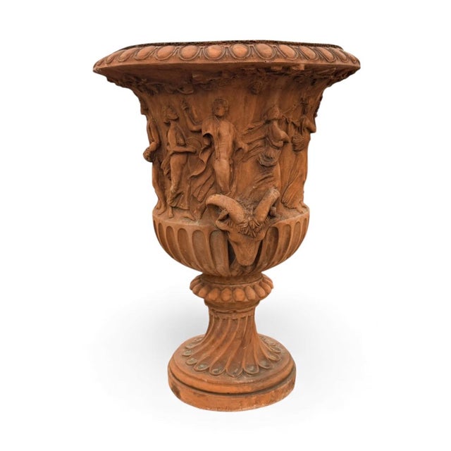A magnificent pair of Neoclassical-style terracotta garden urns, expertly crafted and patinated to evoke the grand...